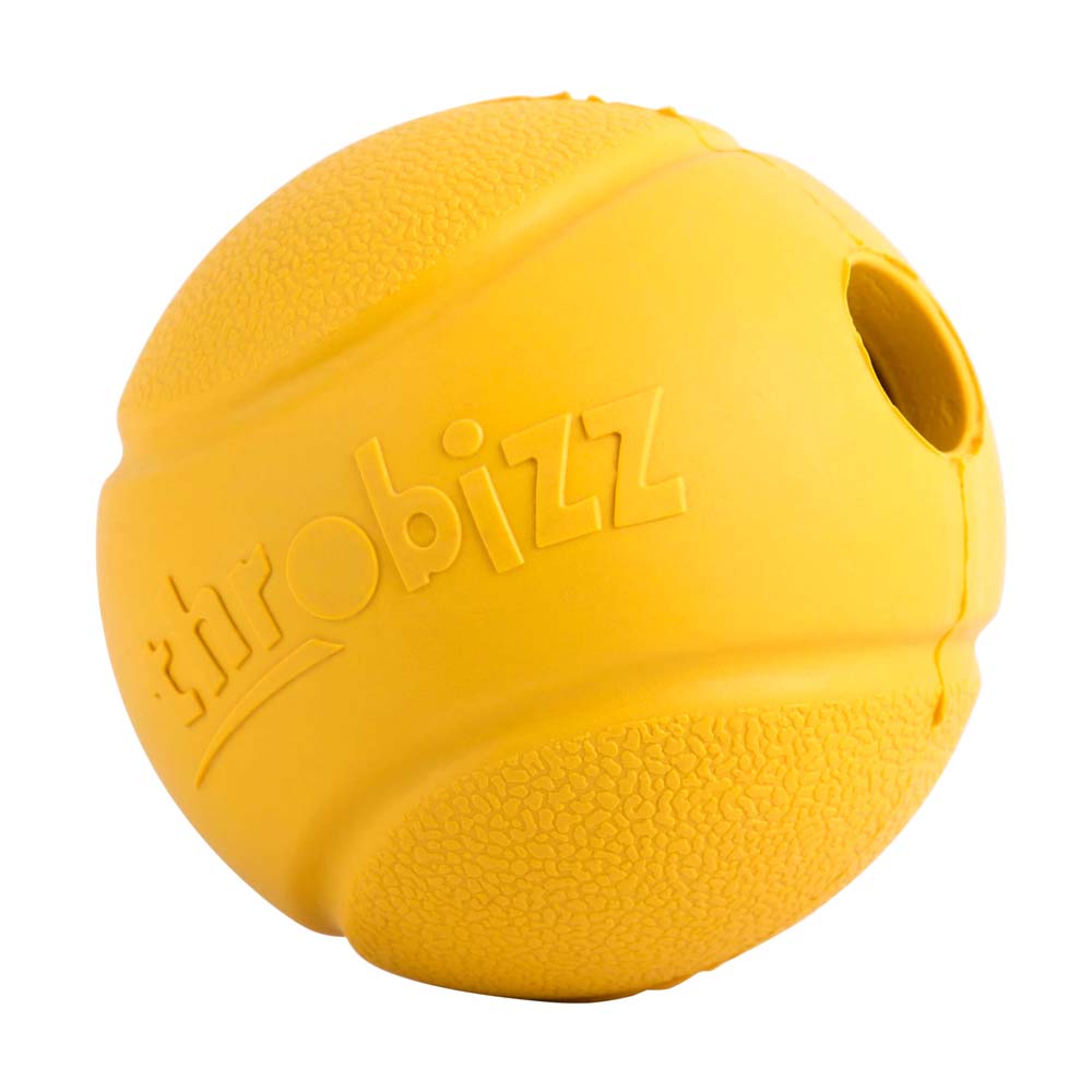 yellow rubber dogball with hole either end
